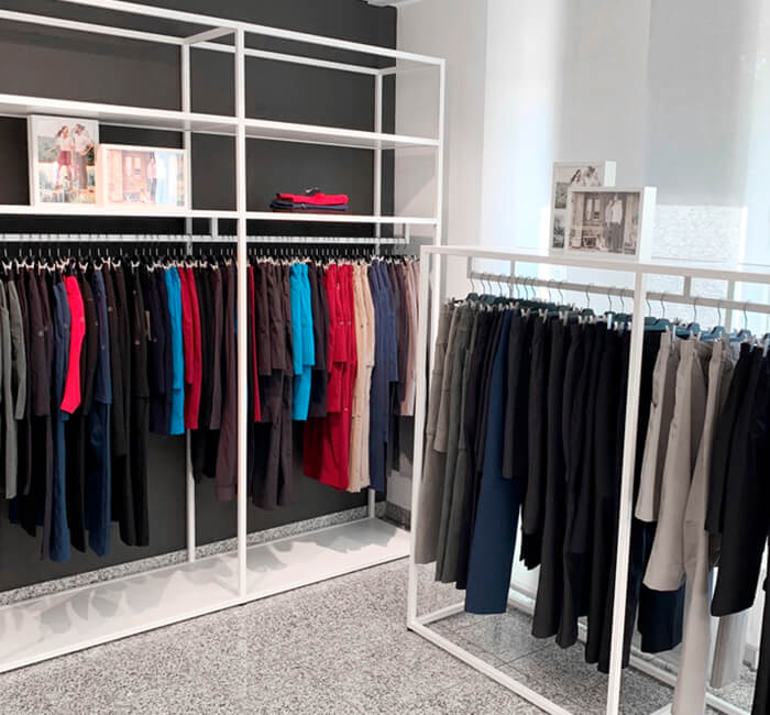 Showroom with product carriers and numerous collection items from the Scoretex Home of Brands brands.