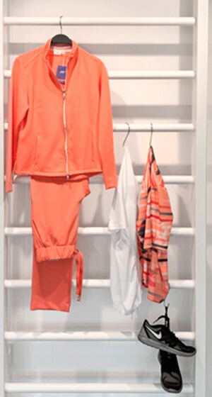 Showroom with product carriers and numerous collection items from the Scoretex Home of Brands brands.