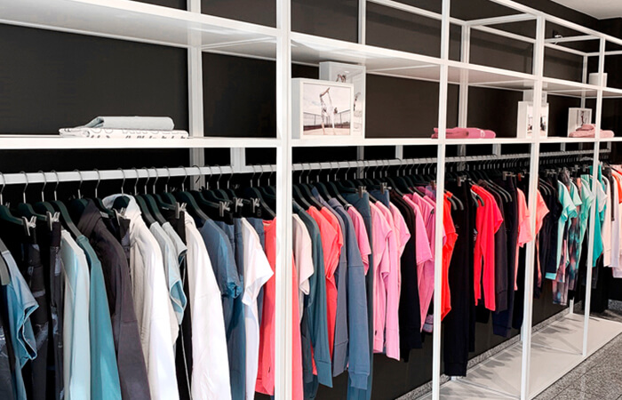 Showroom with product carriers and numerous collection items from the Scoretex Home of Brands brands.