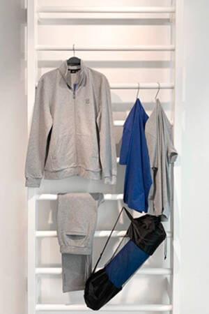 Showroom with product carriers and numerous collection items from the Scoretex Home of Brands brands.