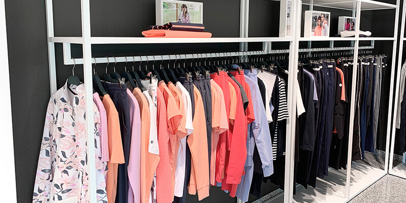 Showroom with product carriers and numerous collection items from the Scoretex Home of Brands brands.