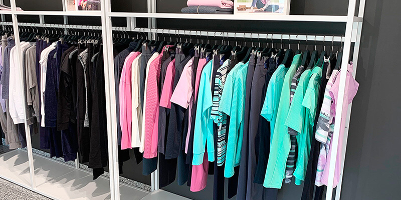 Showroom with product carriers and numerous collection items from the Scoretex Home of Brands brands.